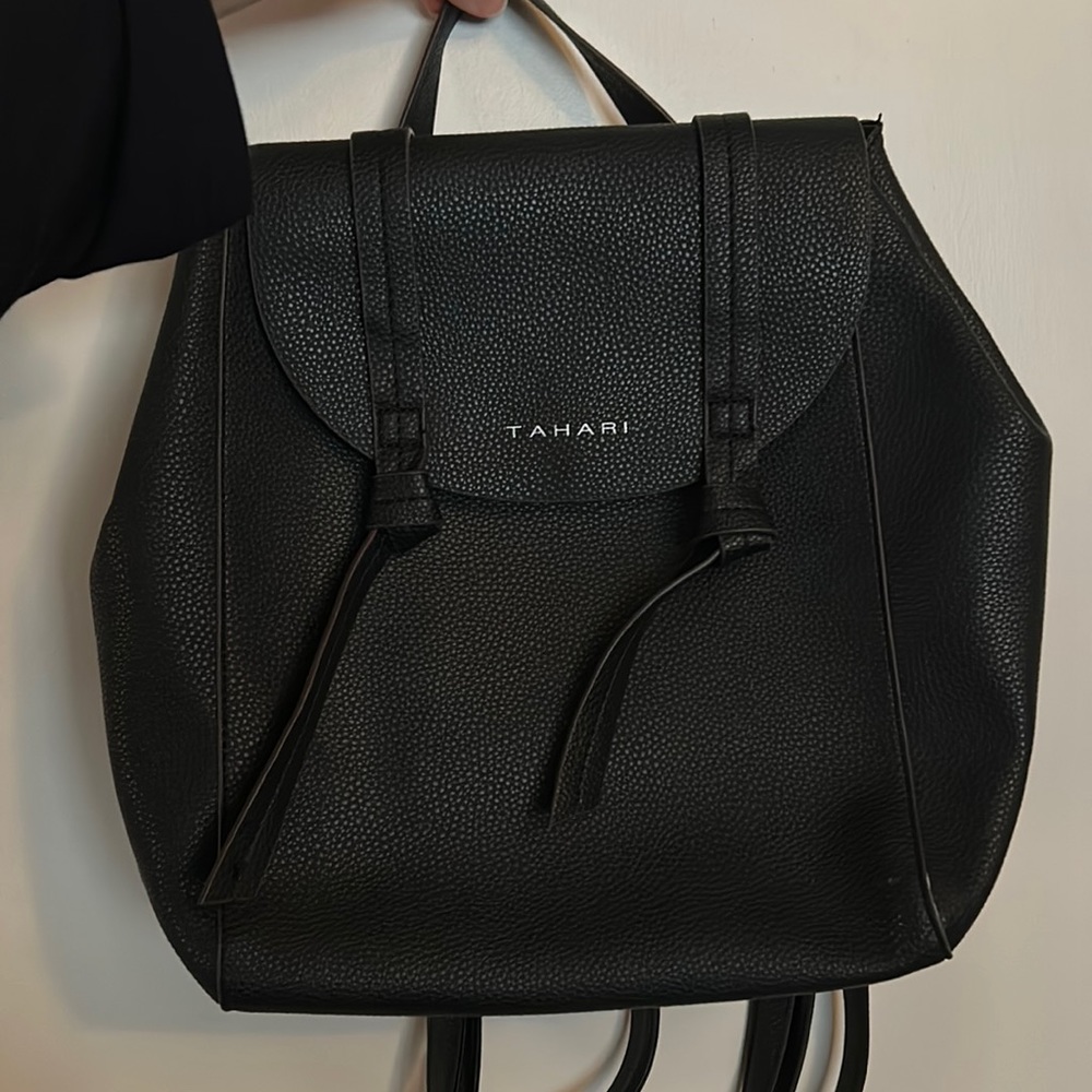 Tahari backpack with button closure